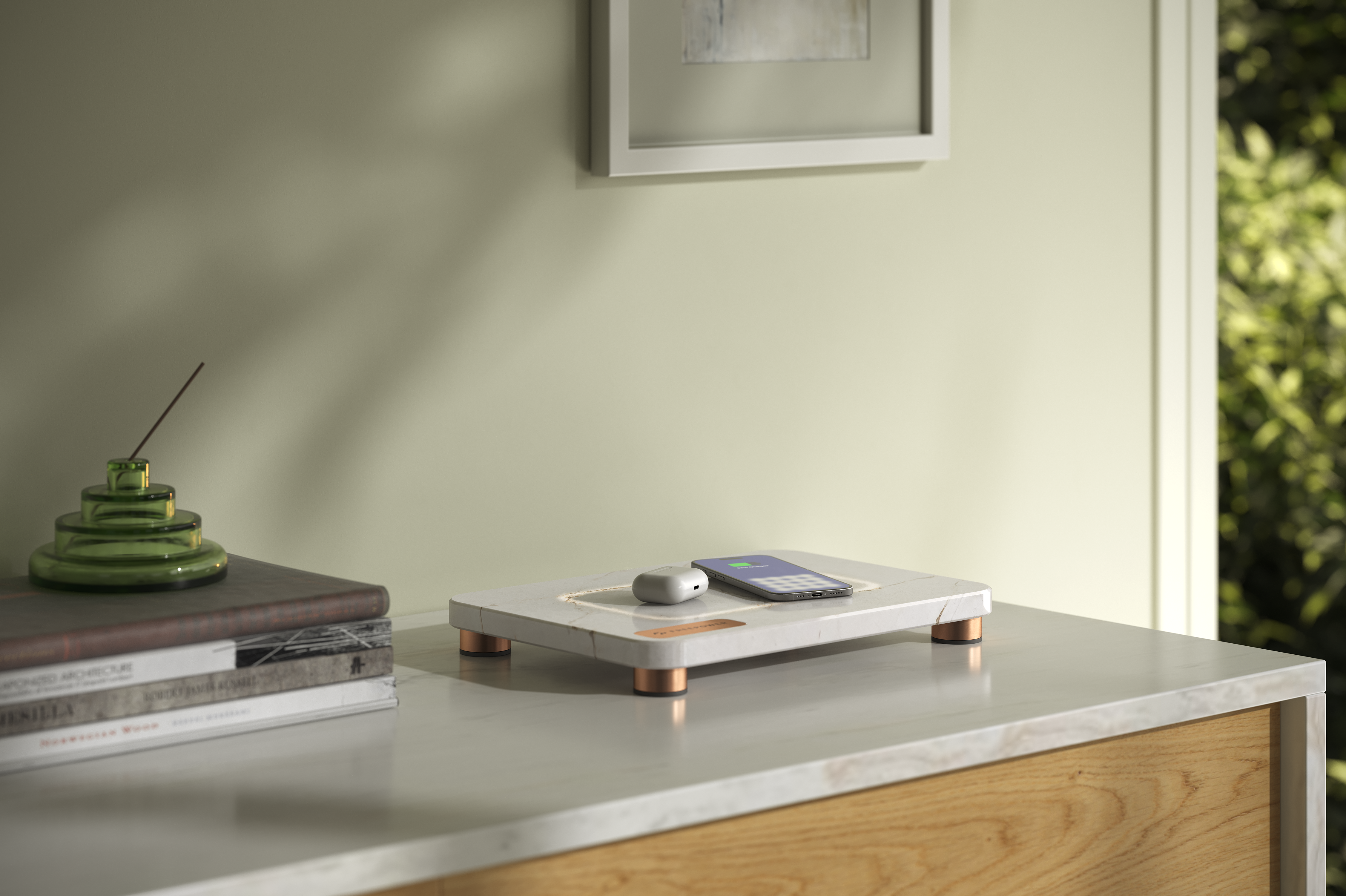 Photorealistic CGI render of a premium wireless charging tray with a smartphone and earbuds on a modern tabletop by Eugeniu Zmeu