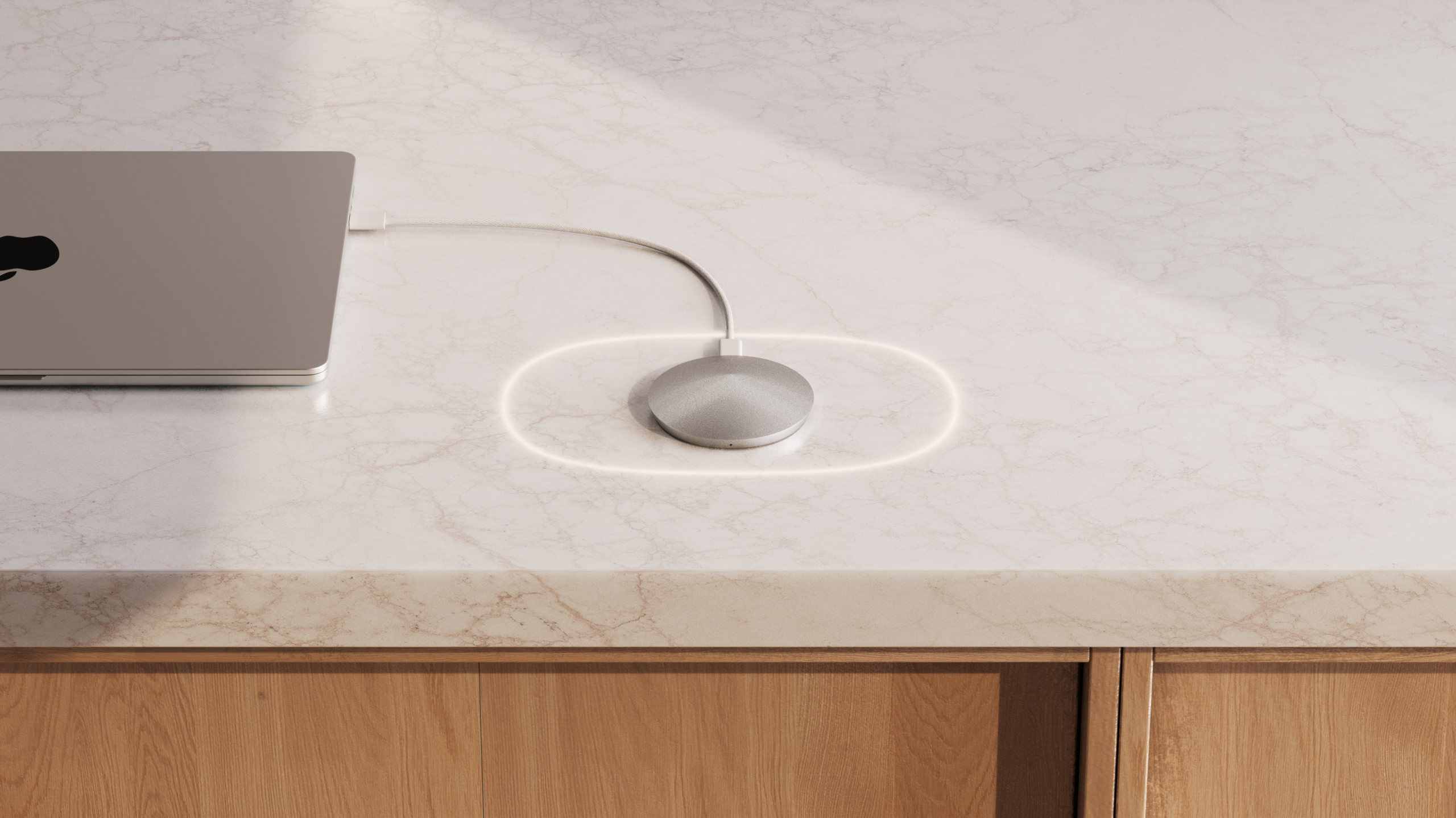 3D product render by Eugeniu Zmeu of a wireless charging pad on a marble countertop